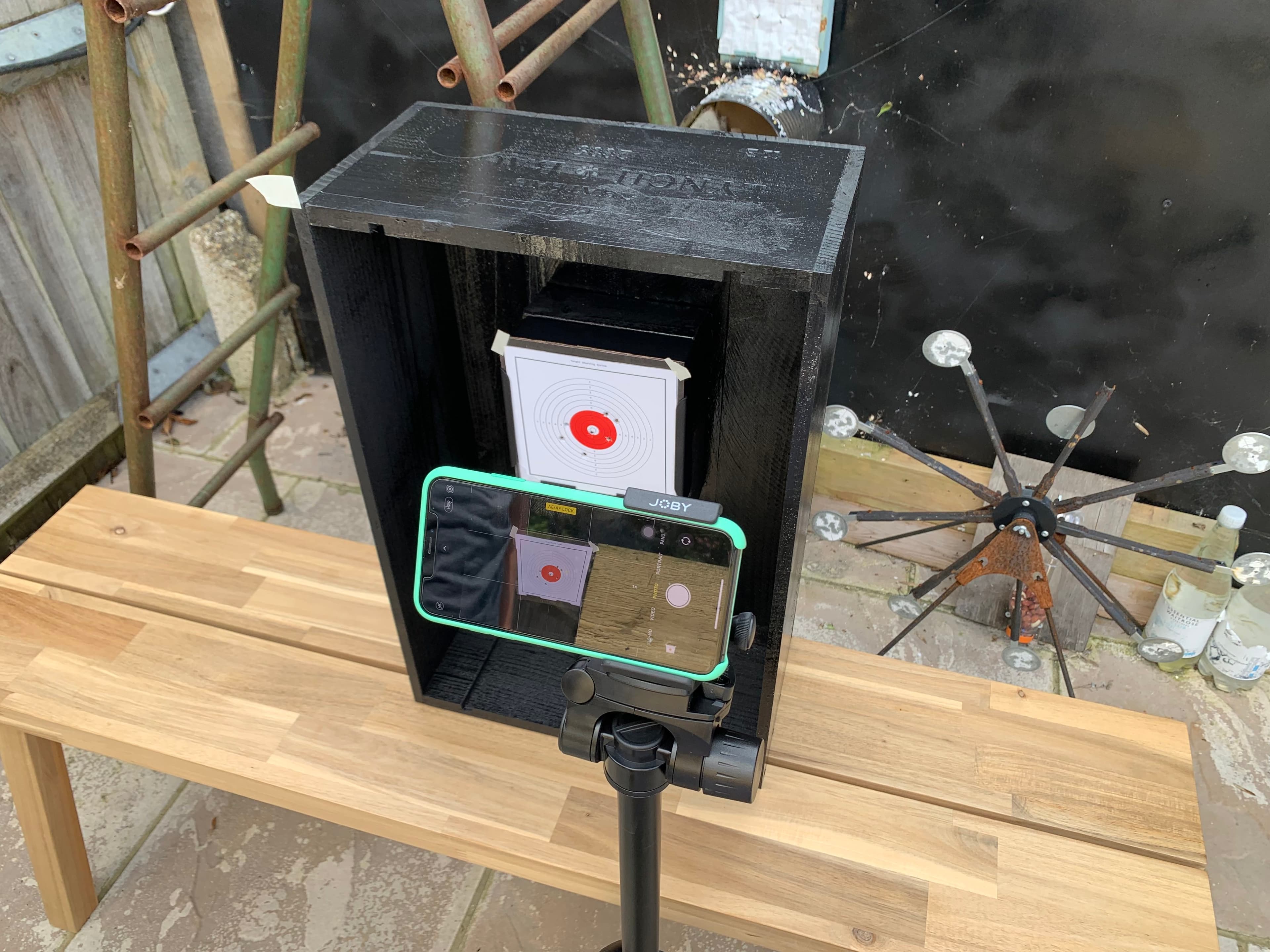 Close-up of the target box showing phone framing and paper target